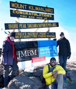 Capoccia, Oketch and Bonstelle at the peak of Kilimanjaro.